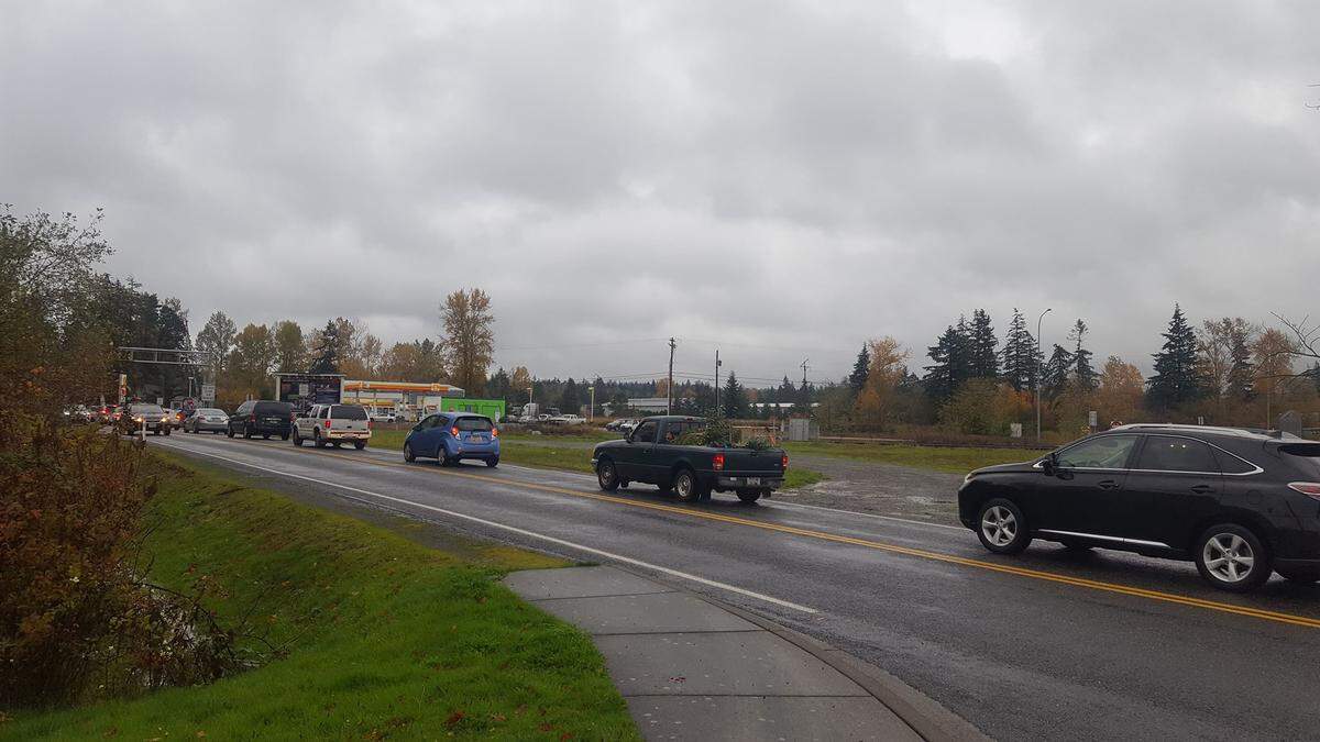 Traffic near a train crossing moves slowly on Bell Road at Runge Avenue, south of Peace Portal Drive in the late afternoon of Nov. 1.