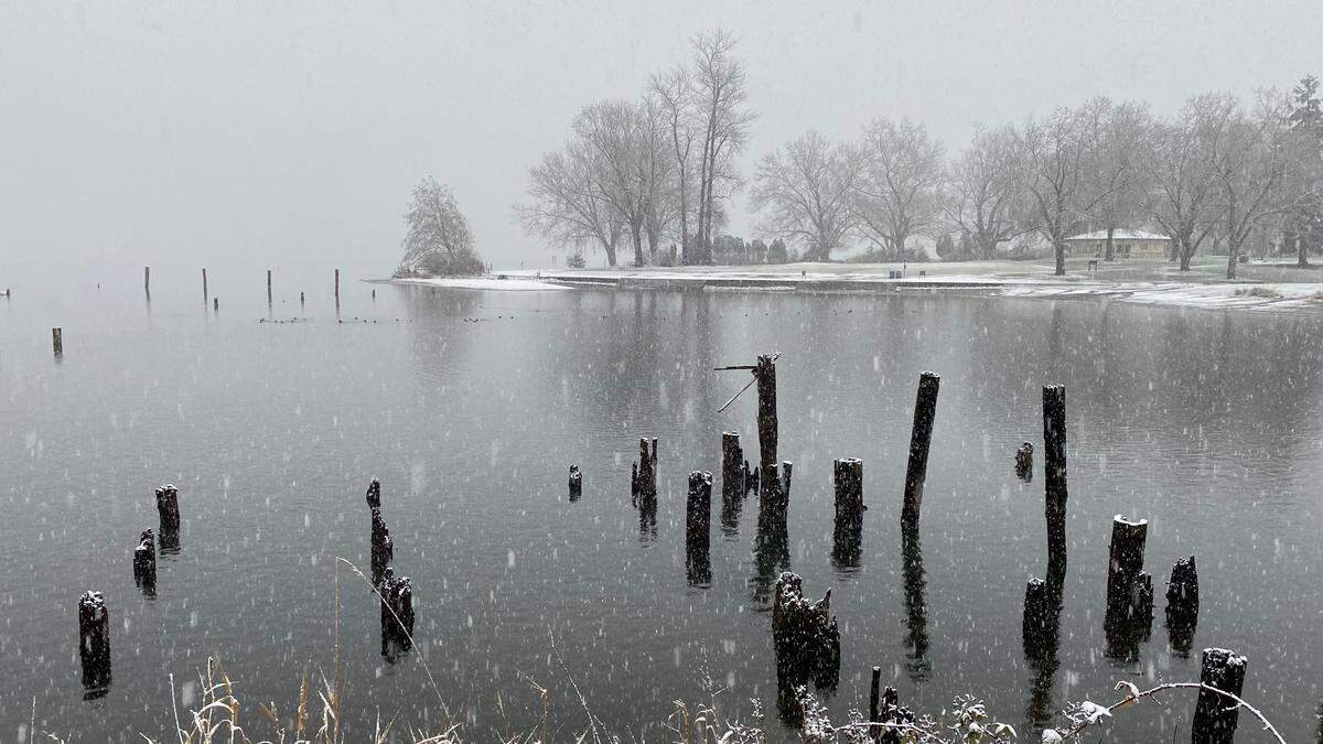 Snow falls on Lake Whatcom near Bloedel Donovan Park in Bellingham on the winter solstice, Monday, Dec. 21.