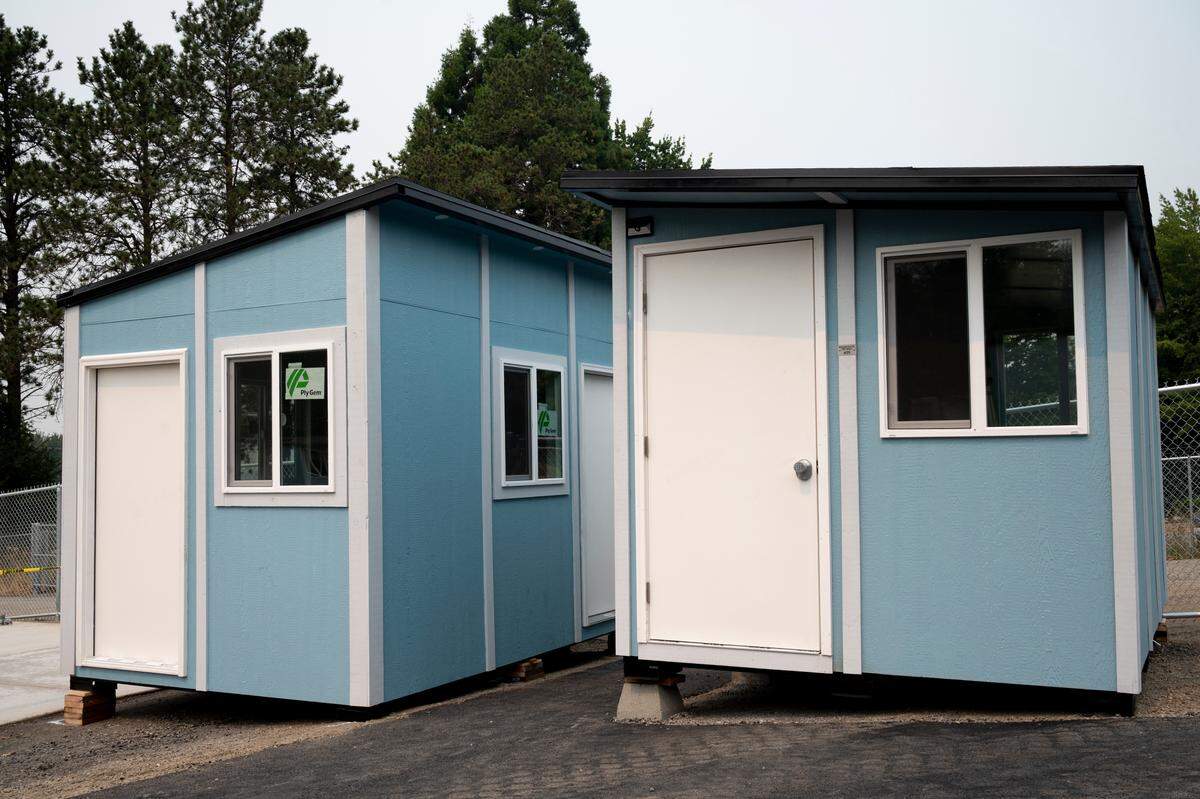 New tiny homes sit at the new Gardenview Village on the corner of Lakeway Avenue and Woburn Street on Friday, Aug. 13, in Bellingham.