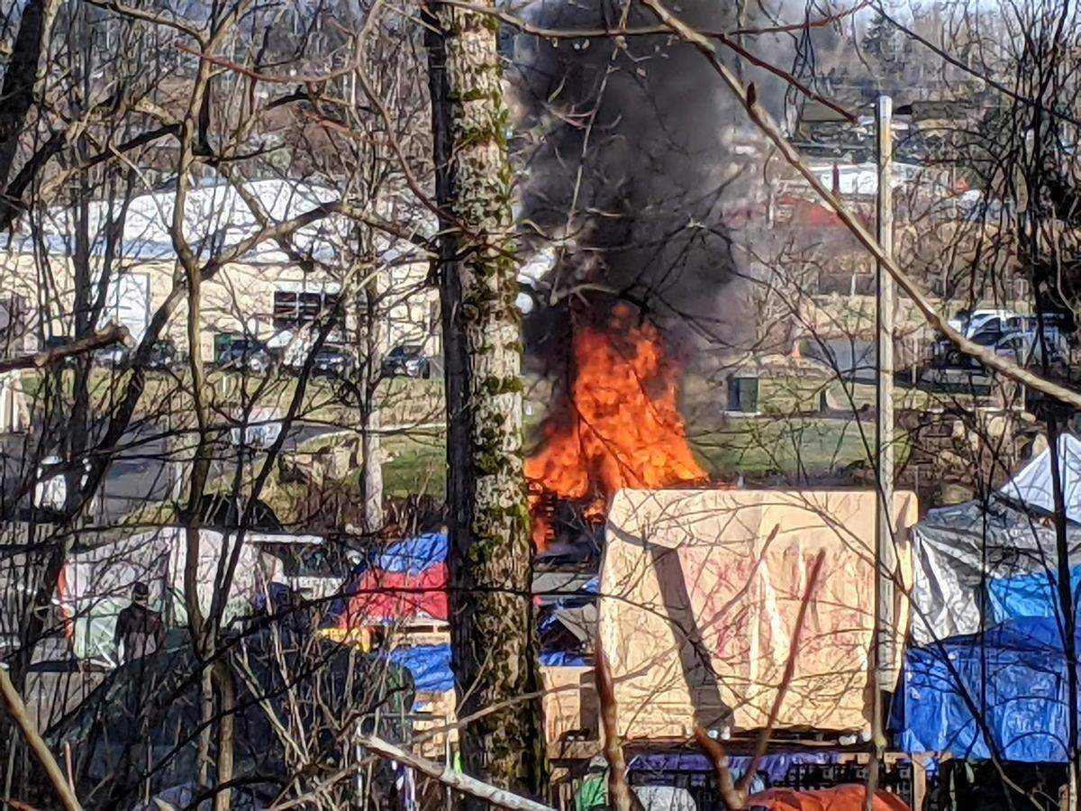 A propane heater is believed to have caused an explosion and a tent to burn Monday, March 8, at the homeless encampment in the lower parking lot of Frank Geri Softball Fields.