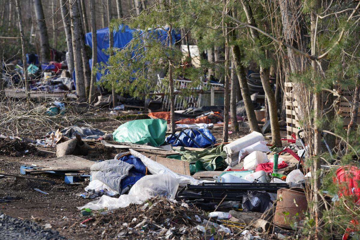 Personal belongings, including sleeping bags and tents, were scattered throughout the encampment on West Bakerview Road and Northwest Drive as crews worked to clear it on January 21, 2025, in Bellingham, Wash.
