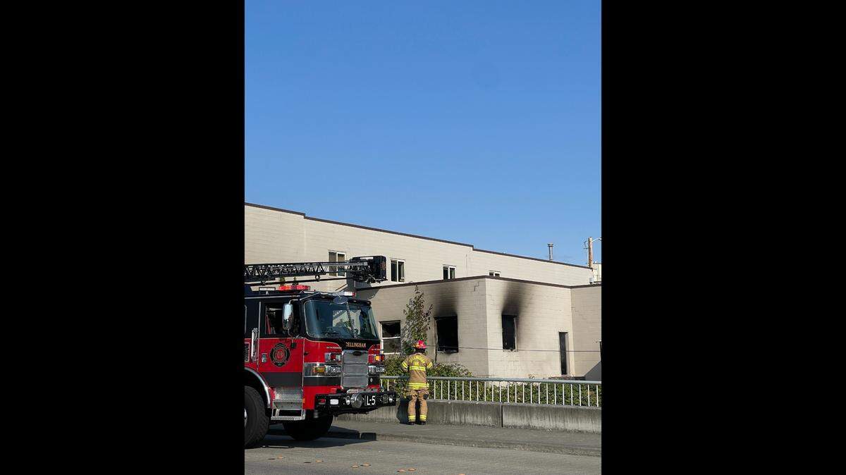 Bellingham Fire crews work to put out a commercial fire around 5 p.m. on Monday, Aug. 7, in downtown Bellingham, Wash.