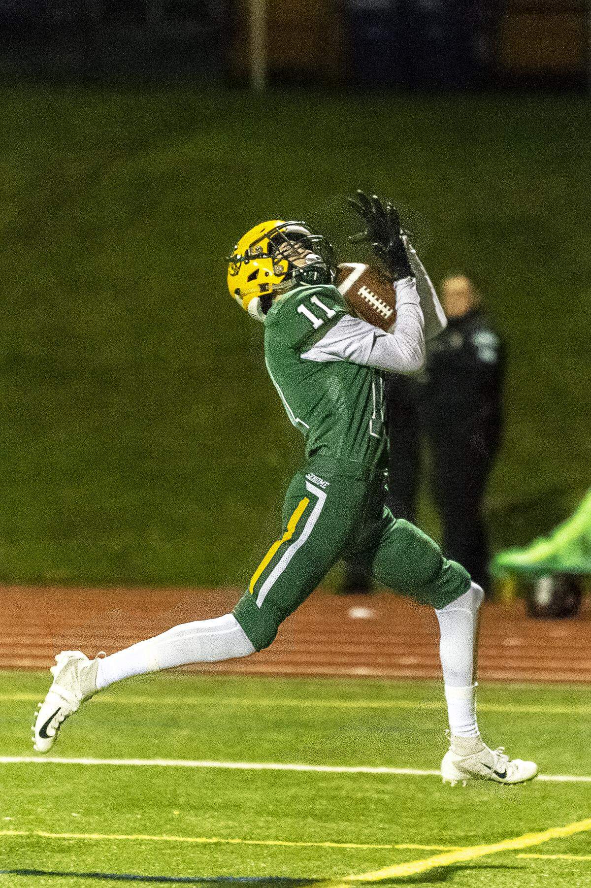 Sehome wide receiver Melloy Nelson catches a pass in the end zone for a touchdown Oct. 11. Nelson and Tim Malo helped the Mariners win the Lake Division title for a second straight year and head into the postseason Friday.