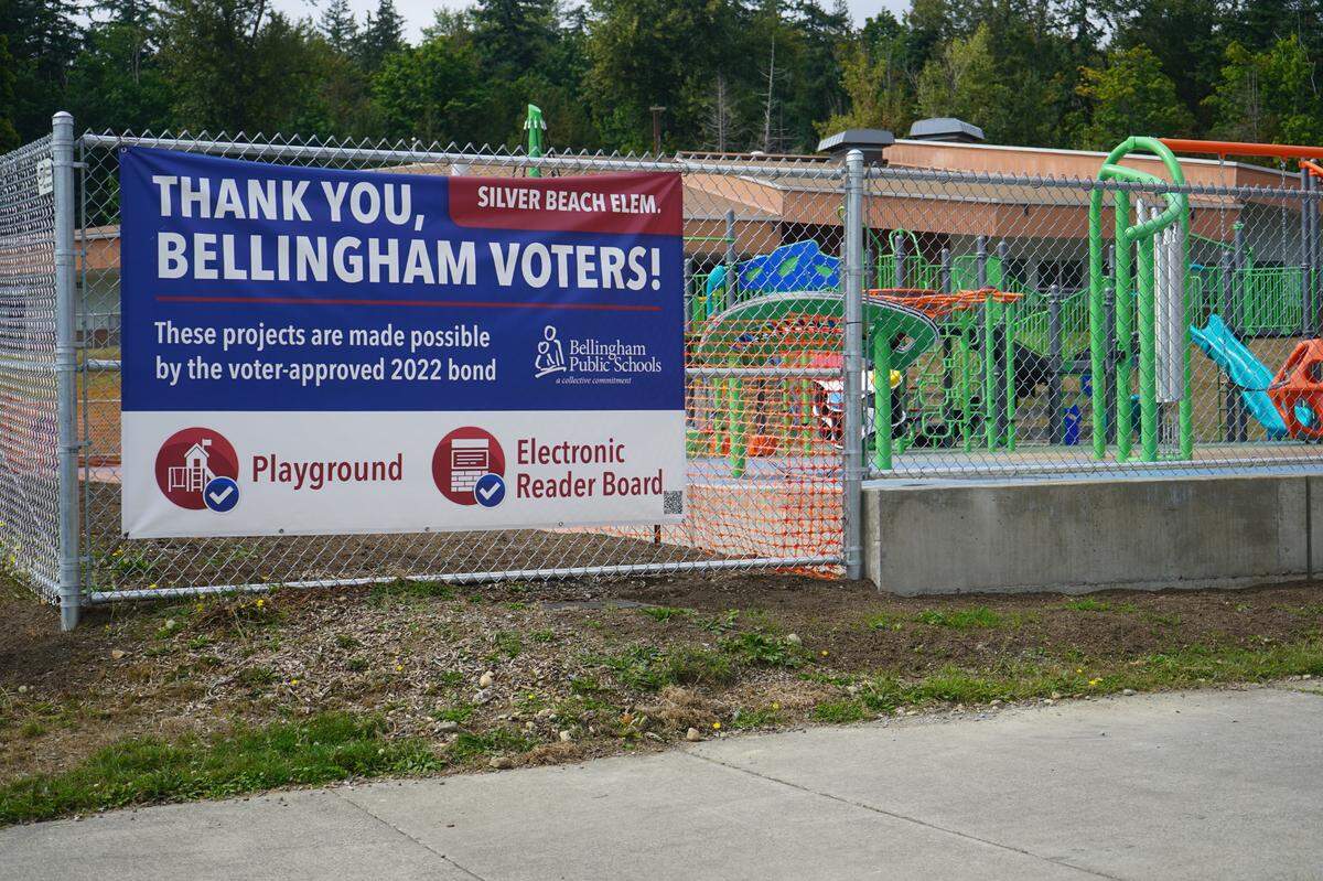 A sign posted in front of the newly finished inclusive playground at Silver Beach Elementary School on Sept. 6, 2023, thanks voters for approving the bond that funded the project in Bellingham, Wash.