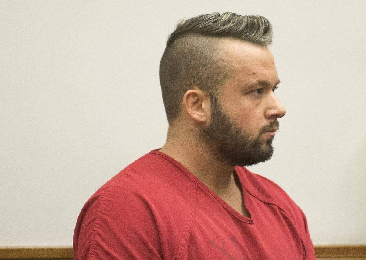 Brooks Owen Laughlin, 33, of Everson pleads not guilty at his arraignment on Friday in Whatcom County Superior Court in Bellingham.  Laughlin, a Bellingham Police corporal, is accused of repeatedly abusing a woman since September 2016. He is charged with multiple counts of second-degree assault, tampering with a witness, felony harassment, violation of a no-contact order and one count each of felony stalking, criminal trespass and harassment.