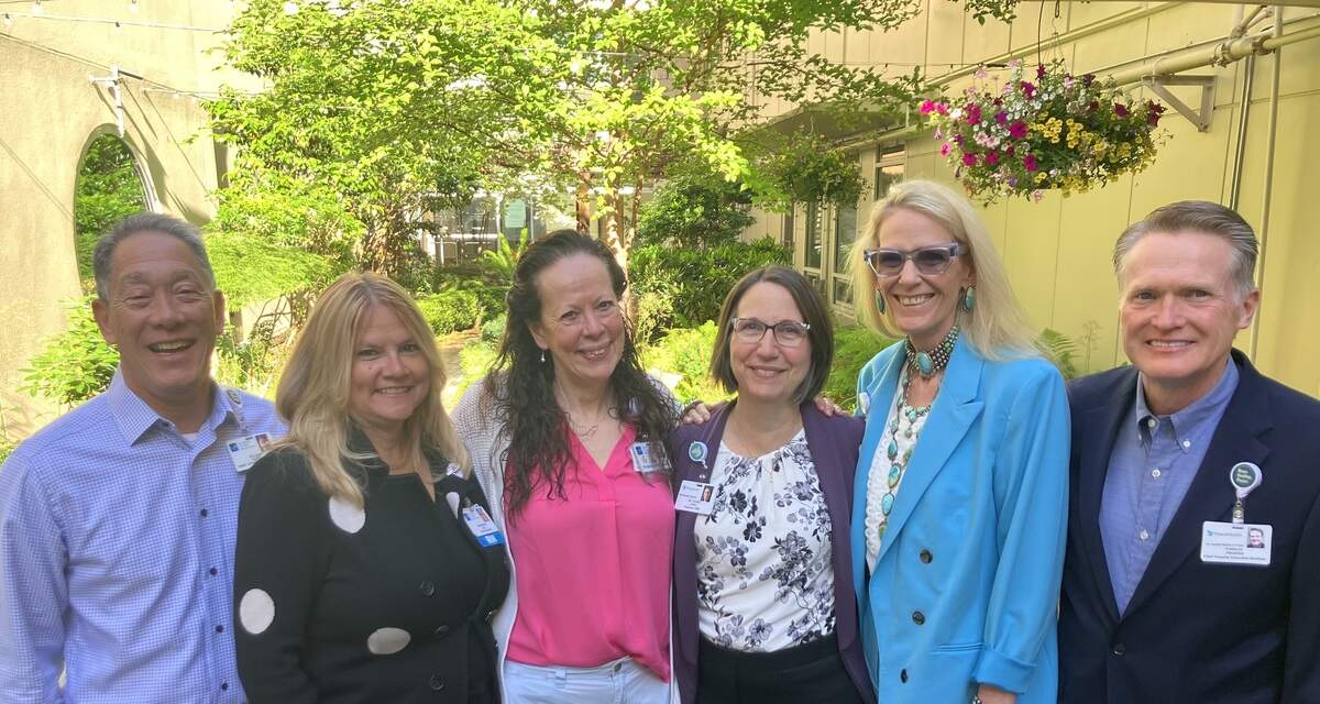 St. Joseph Medical Center Director of Patient Safety Joni Dixon (center left) poses for a photo with members of the PeaceHealth executive team recently in Bellingham. From left: Chief Operating Officer Elliot Kuida, Chief Nursing Officer Roseanna Bell, Director of Quality and Patient Safety Joni Dixon, Chief Medical Officer Dr. Lorna Gober, Chief Financial Officer Krista Touros and CEO Charles Prosper.