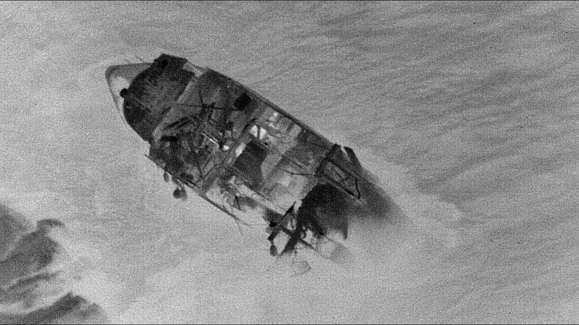 A Coast Guard C-130 Hercules aircraft took this photo of the trawler Laura as it capsized Nov. 1 off Kodiak, Alaska