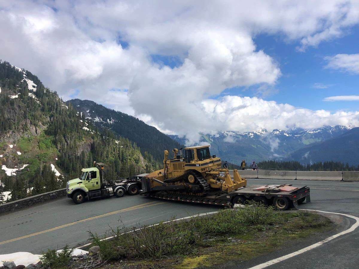 Crews completed the clearing of SR 542, the Road to Artist Point, Monday, July 11, and the road is now open to non-oversized vehicles for the season. To clear the road, Washington State Department of Transportation crews regularly contend with deep snow that requires skip loaders and other heavy equipment.