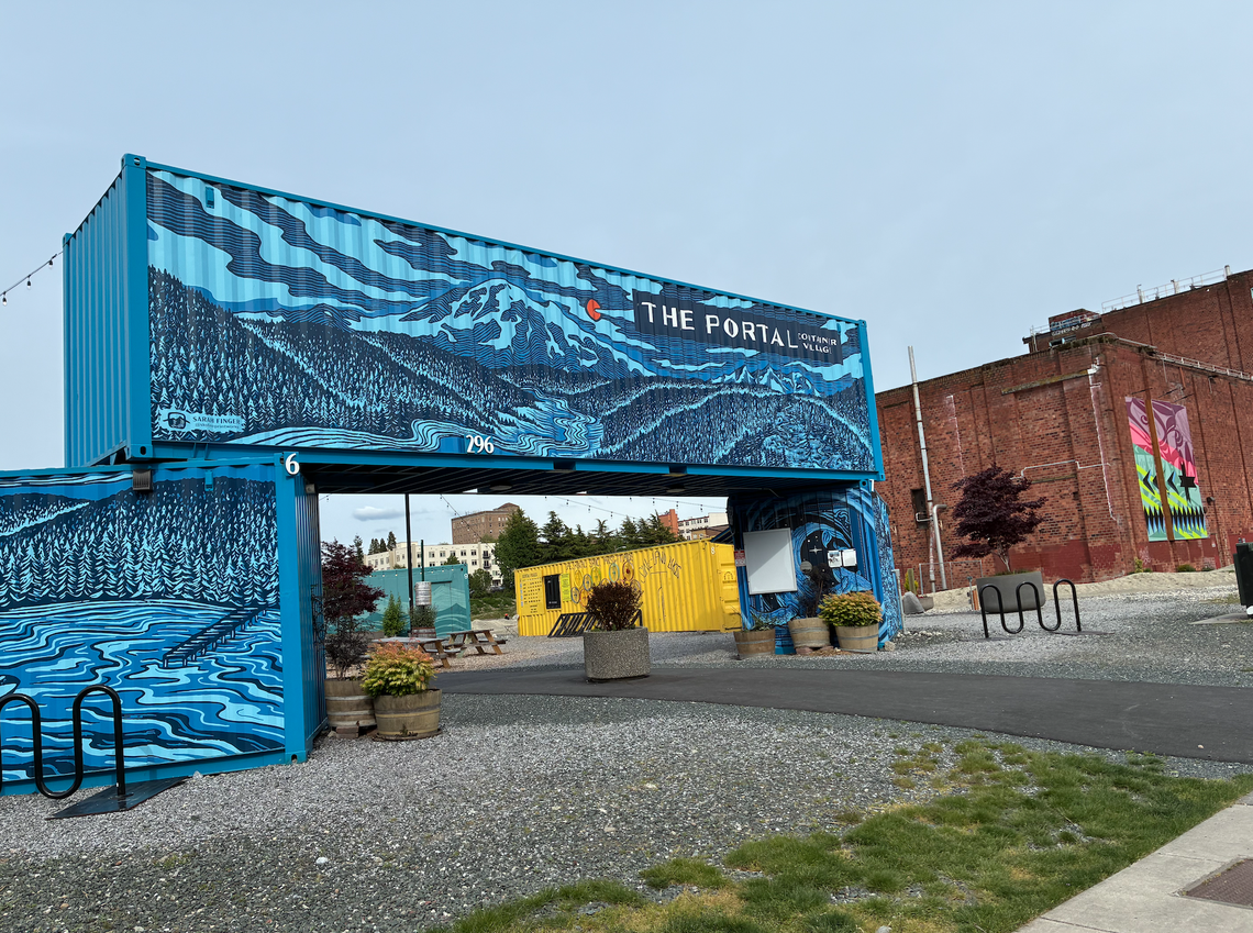 The Portal Container Village offers food stalls and bike rentals near Bellingham’s waterfront.