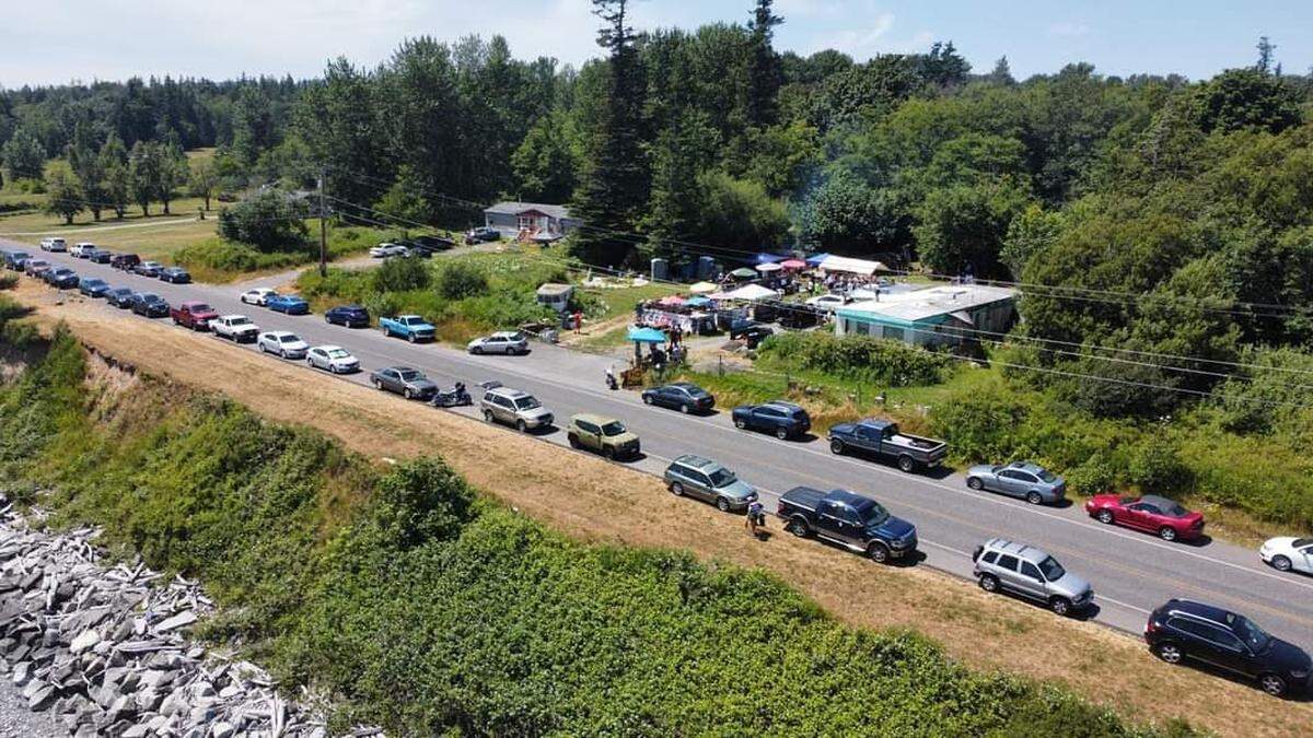 A aerial photo shows an undated gathering at the Lummi Shore home that was destroyed by fire.
