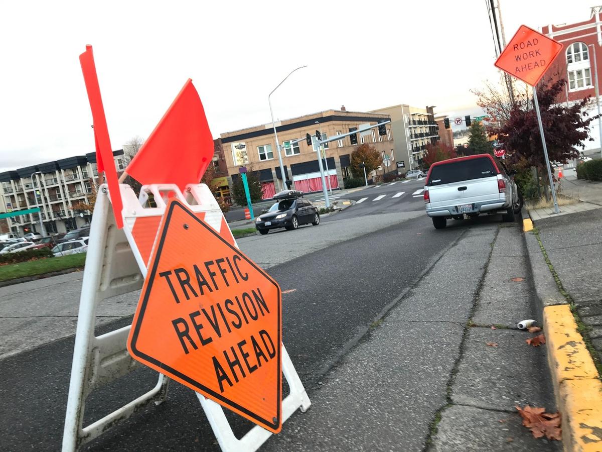 A “traffic revision” sign warns of new stoplights and crosswalk signals at North State and Maple streets on the south end of downtown Bellingham on Oct. 7.
