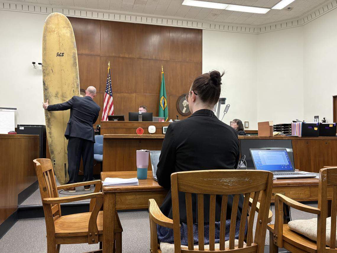 During the murder trial of Lynda Mercy in February 2026 in Whatcom County Superior Court, prosecutors held up a surfboard taken into evidence after it was found in a van belonging to Thomas Flood, whose body was discovered on the Semiahmoo Spit in 2021.