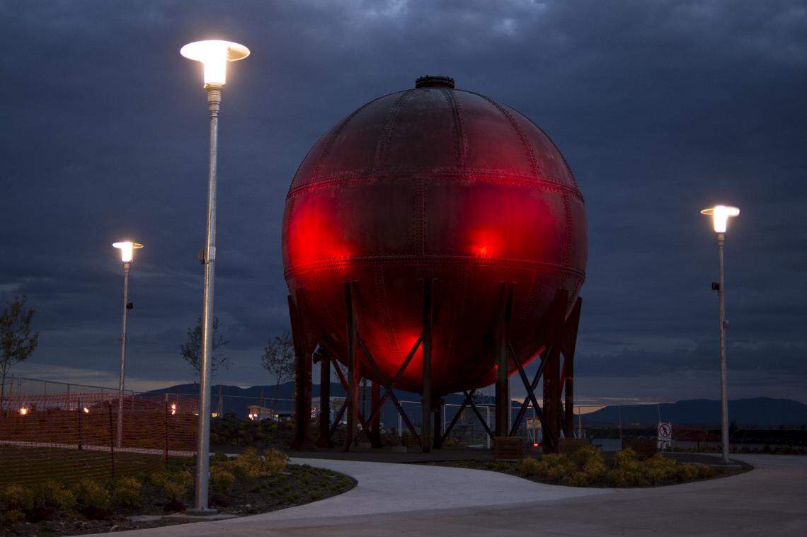 The "acid ball" reflects red light during twilight at Waypoint Park in Bellingham.