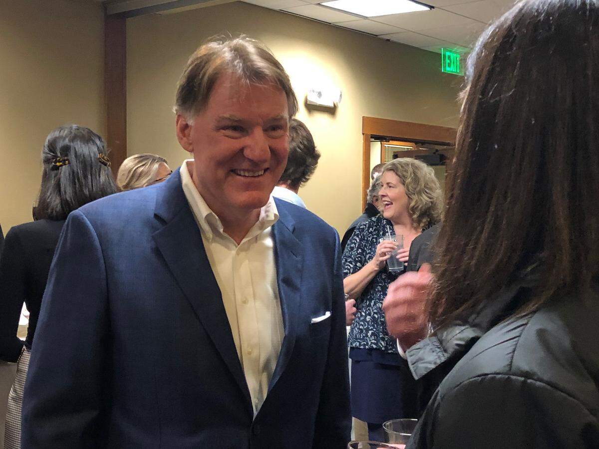 Whatcom County executive candidate Tony Larson mingles with election night partygoers at the Bellingham Golf and County Club Tuesday.