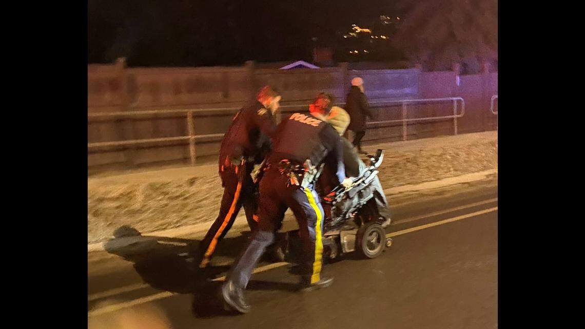 Two constables with the Royal Canadian Mounted Police are being lauded on social media for pushing a man home in his wheelchair after it stalled in traffic Jan. 31.