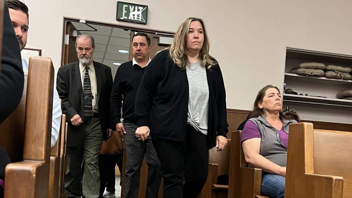 Tana Perkins Reneau enters Whatcom County Superior Court for her arraignment on Friday.