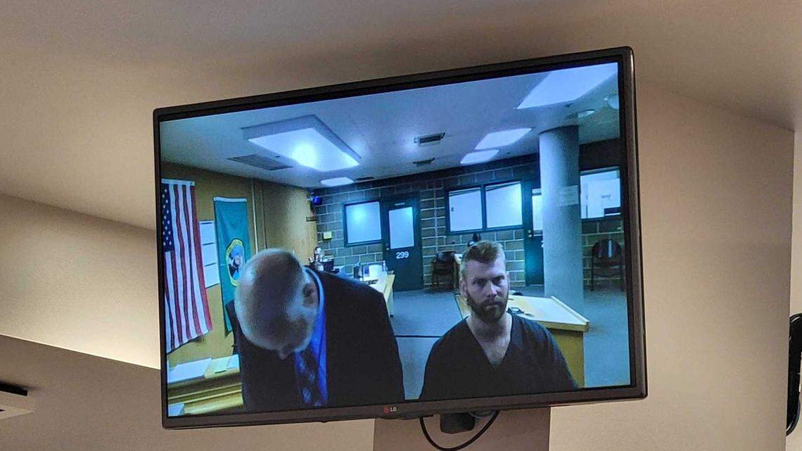 Brian Matthew Drake, 31, of Bellingham, right, makes his first appearance in Whatcom County Superior Court on Wednesday, Sept. 20, 2023. Drake is accused of nearly two dozen sex crimes for the years-long sexual abuse of two female children, according to court records.