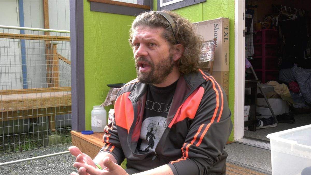 Chriss Clemens speaks about his experience as a resident of the tiny home community Unity Village operated by HomesNOW! in Bellingham.