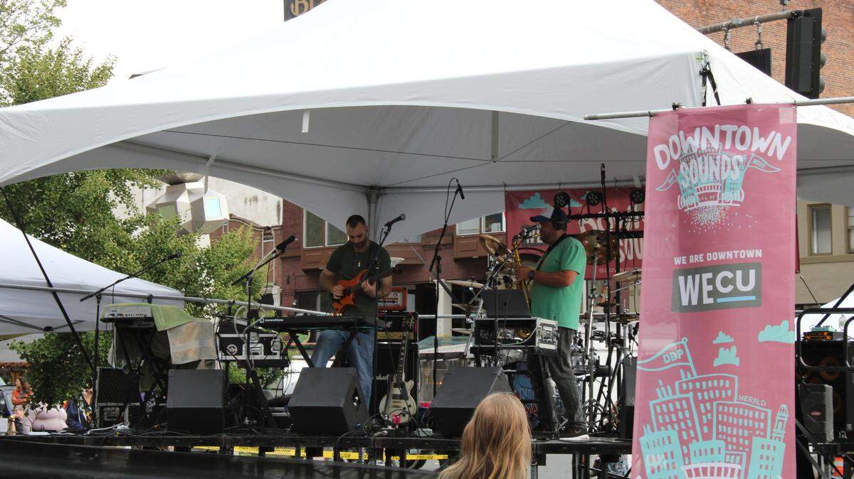 Downtown Sounds, an outdoor weekly live music concerts in downtown Bellingham, Whatcom County is back for summer 2024 with free events. Downtown Sounds returned Wednesday evening, July 6, 2022, for its 18th year with music, food and vendors in a Downtown party at Bay and Prospect streets in Bellingham, Wash.
