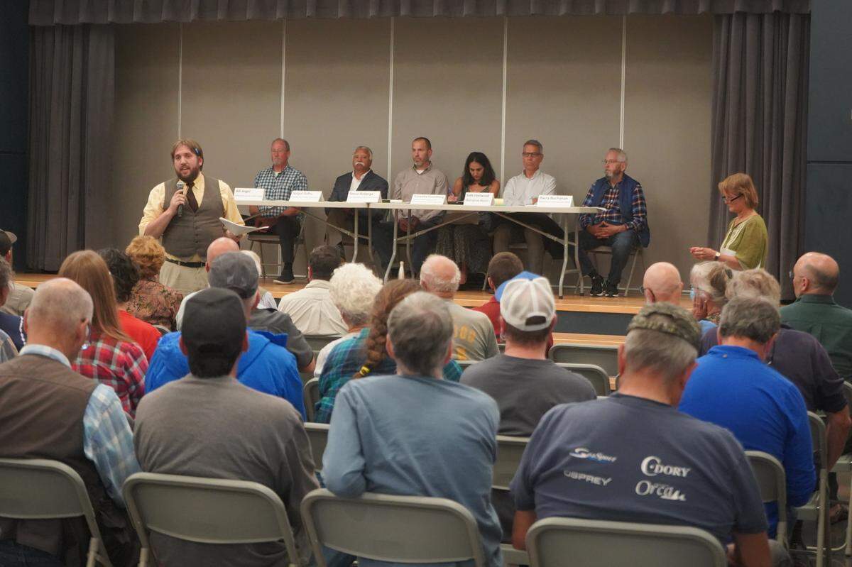 ABC Recycling’s Riley Sweeney answers questions from community members about the company’s proposed metal shredder facility on Sept. 6, 2023, at a community-organized meeting at Alderwood Elementary School in Bellingham, Wash. A panel of county and city leaders also answered community questions.