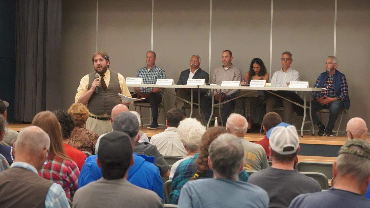 ABC Recycling’s Riley Sweeney answers questions from community members about the company’s proposed metal shredder facility on Sept. 6, 2023, at a community-organized meeting at Alderwood Elementary School in Bellingham, Wash. A panel of county and city leaders also answered community questions.