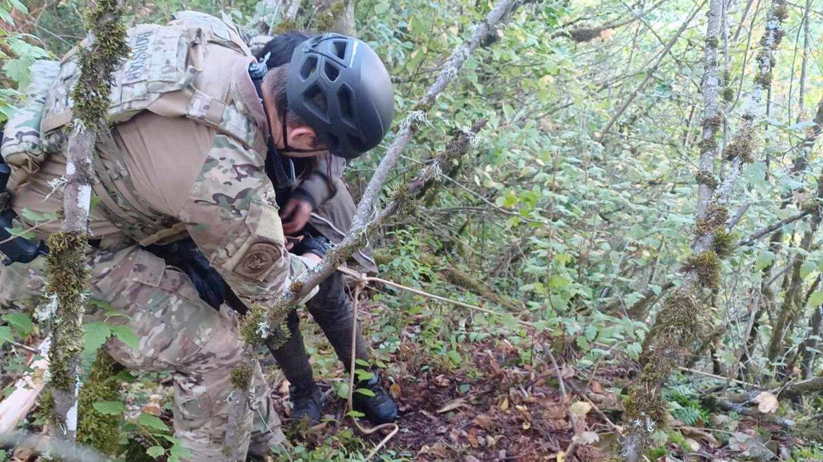 A Blaine Sector Special Operations Detachment conducted a technical rope rescue to retrieve three people who had been abandoned on a mountain by a human smuggler near Sumas in Whatcom County on Sept. 1 2023.