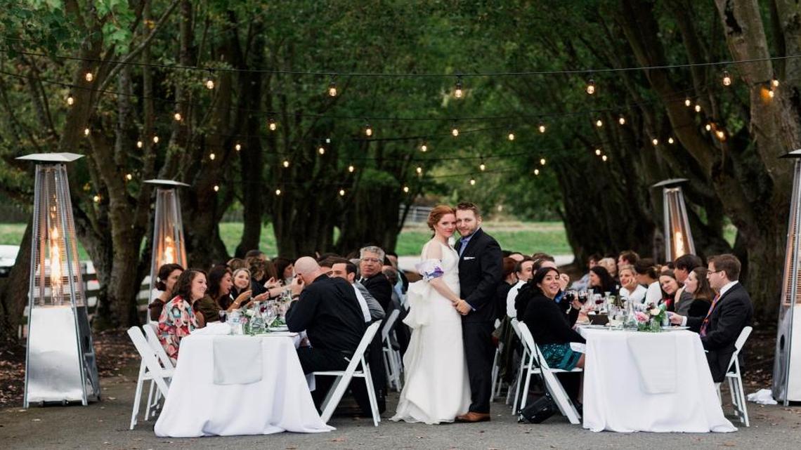 Family-style outdoor meal highlights couple’s wedding