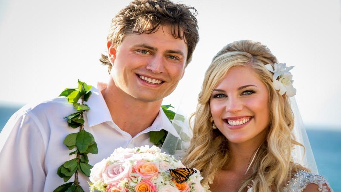 Happiness is a warm wedding by a beach in Hawaii