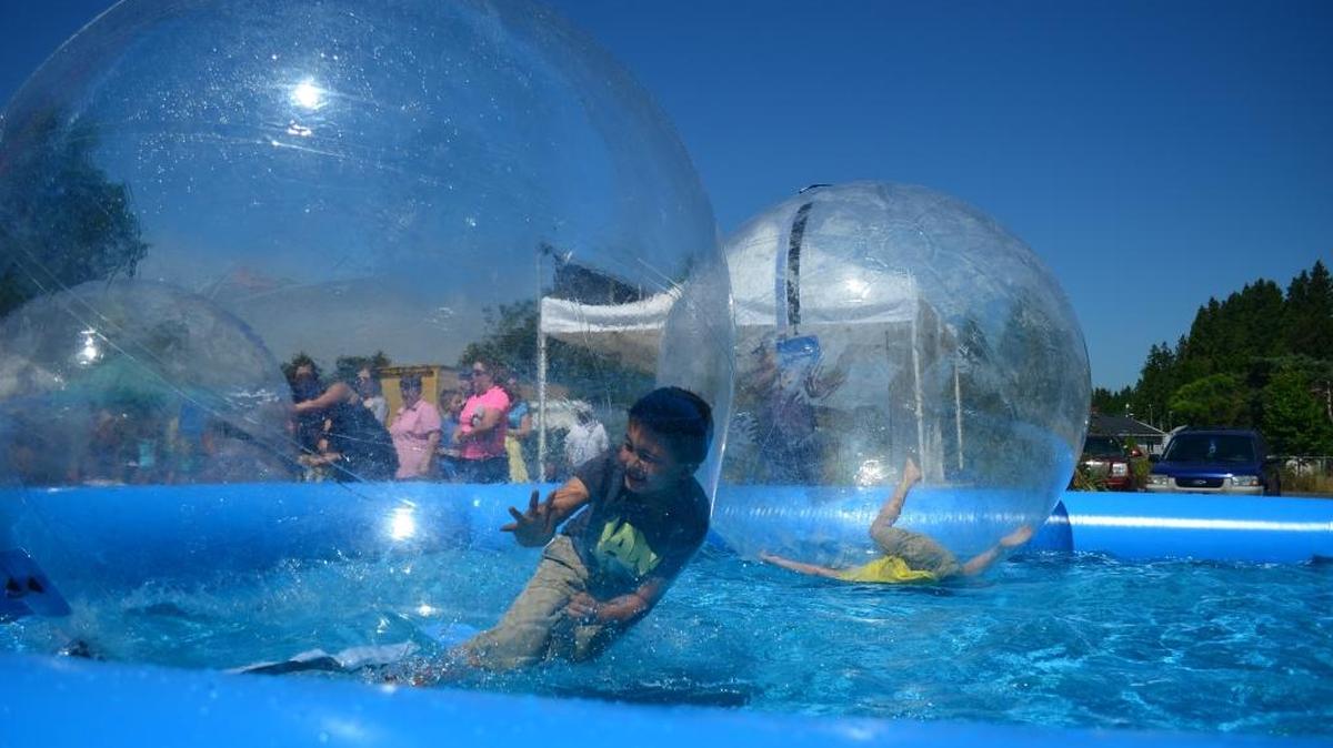 Carlos Bautista, 8, trys to walk on water at the 34th annual Discover Birch Bay Days. This year’s event is set for Sept. 1-2.