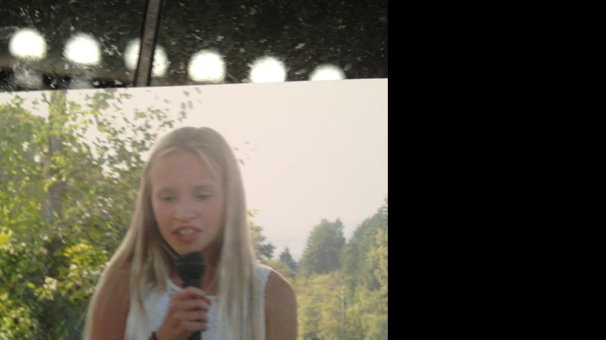 
Mazy Wright sings at her cousin’s 2014 wedding in Woodland, Washington.
