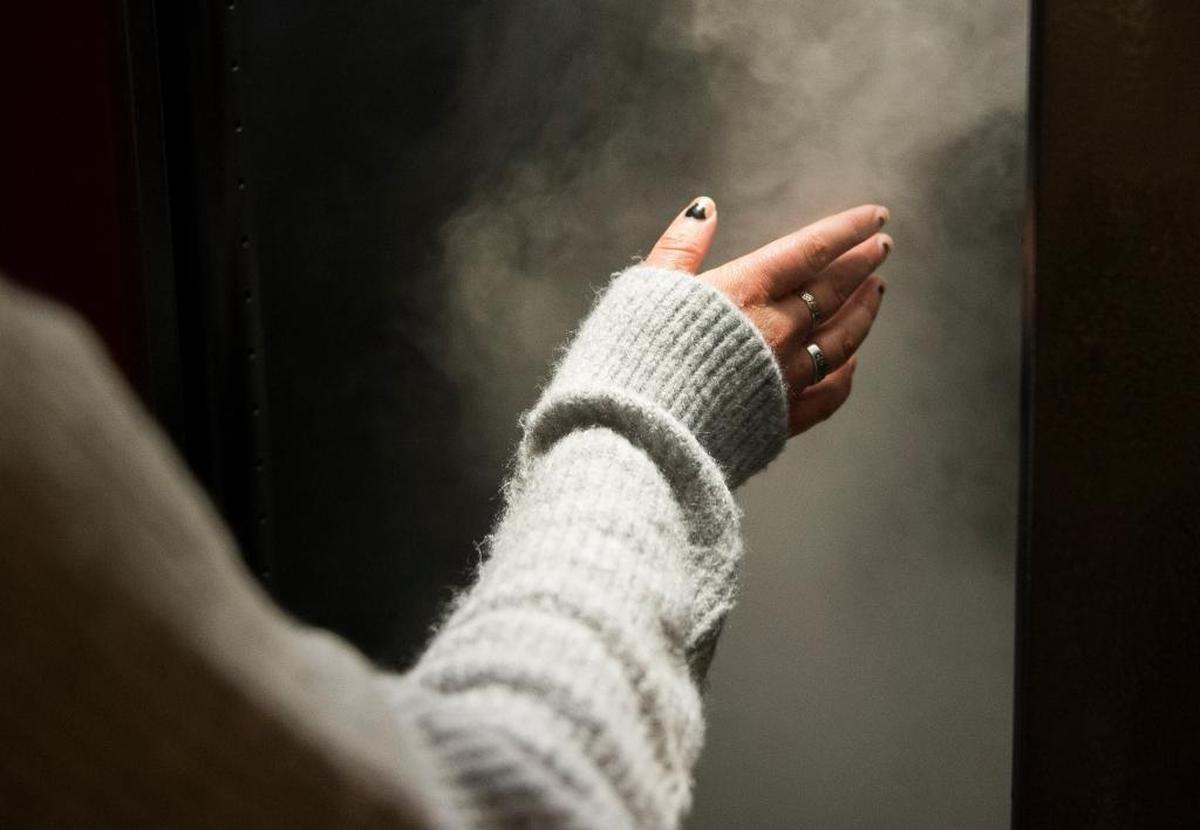 Natasha Scandiffio explores an exhibit simulating a tornado at Mindport Exhibits Feb. 8 in Bellingham.