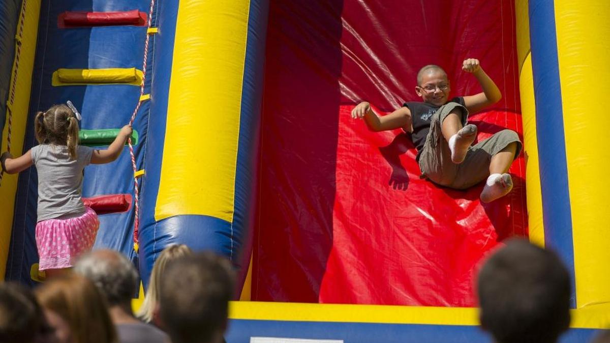 Kids enjoy the Super Scream Slide at the 25th annual Bellingham Kids’s Fest put on by Bellingham’s Parks and Recreation Department. This year’s event is from 11 a.m. to 3 p.m., Saturday, Aug. 4, at Downer Fields at Lakeway Drive and Orleans Street.