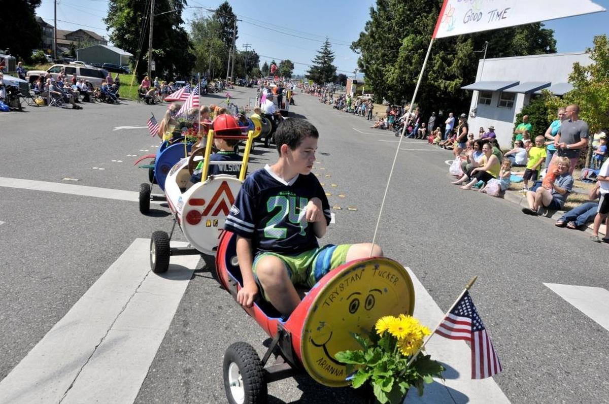 Images from the 2014 Old Settlers Parade in Downtown in Ferndale, Wash., on Saturday morning July 26, 2014.