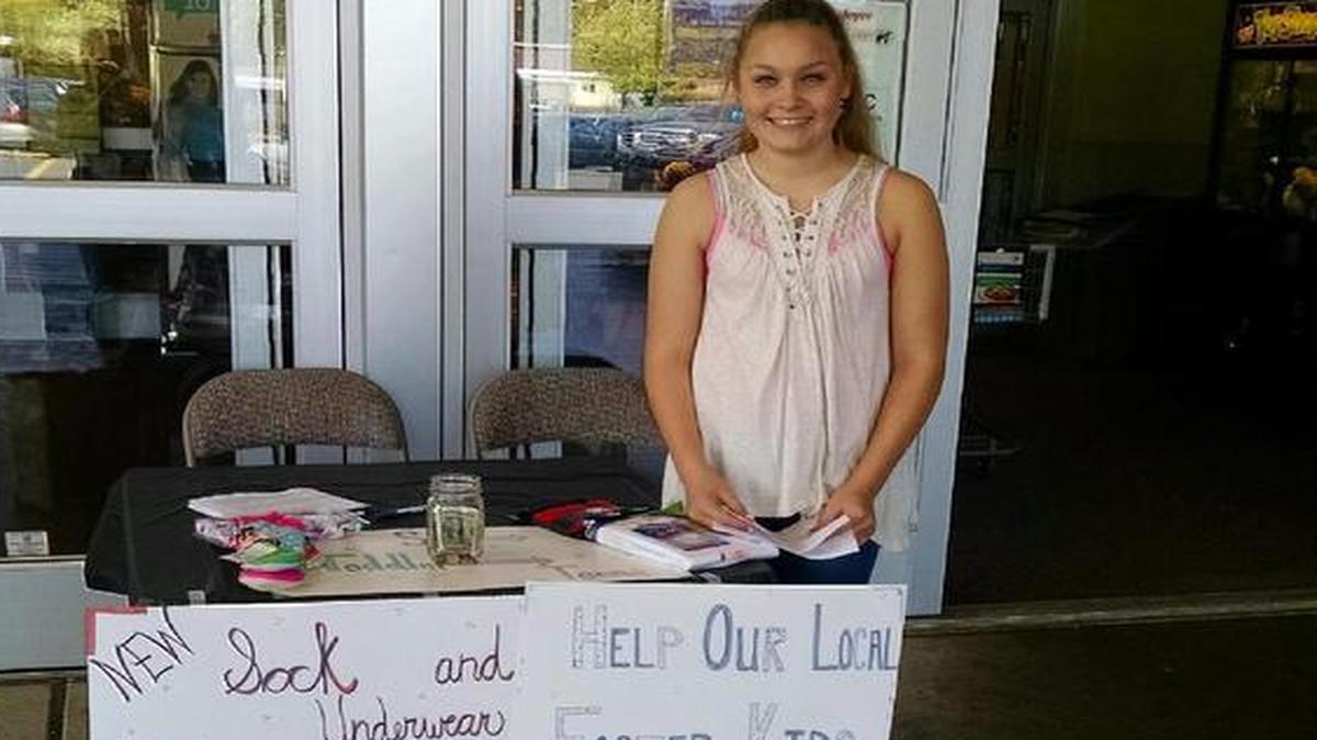 
Haylee Cunningham collects socks and underwear for local foster kids at Fred Meyers Lakeway as part of her eighth-grade breakout project.

