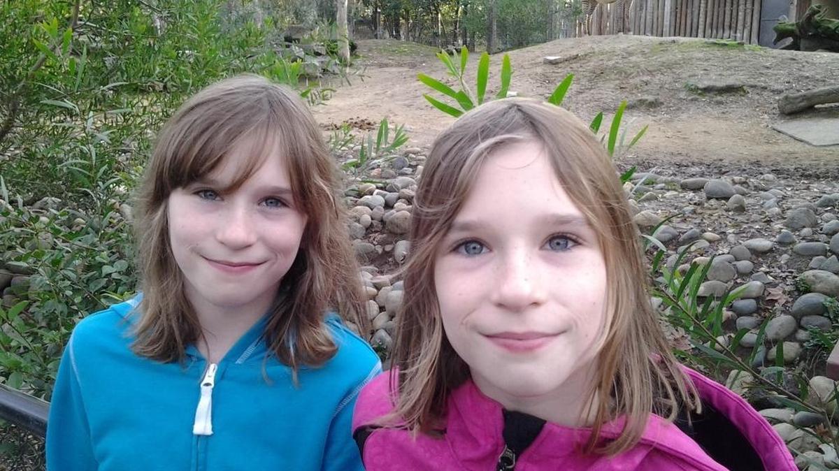 Bellingham twins Dharma and Maya Weller visit the zoo in Sacramento, Calif.