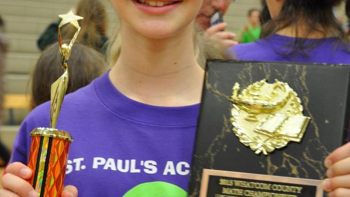 Grace Doud with her awards at the Whatcom County Math Competition.
