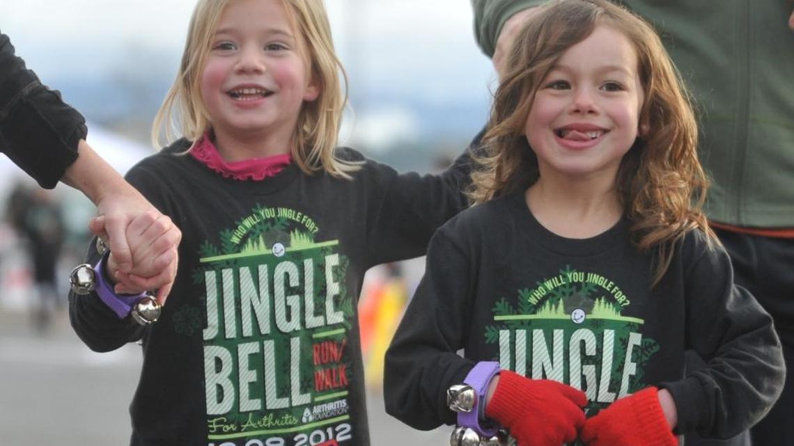Santa hats, elf garb, antlers, Rudolph noses, jingle bells ... and running shoes?