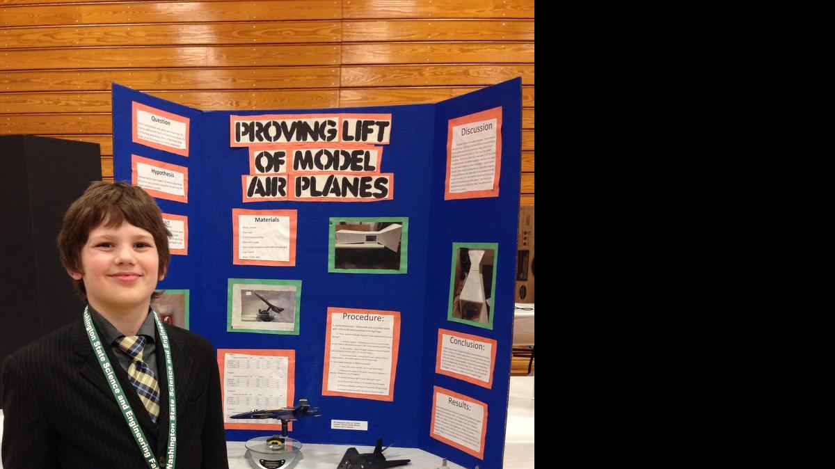 
Braden Campbell presents his science project at the state science fair.
