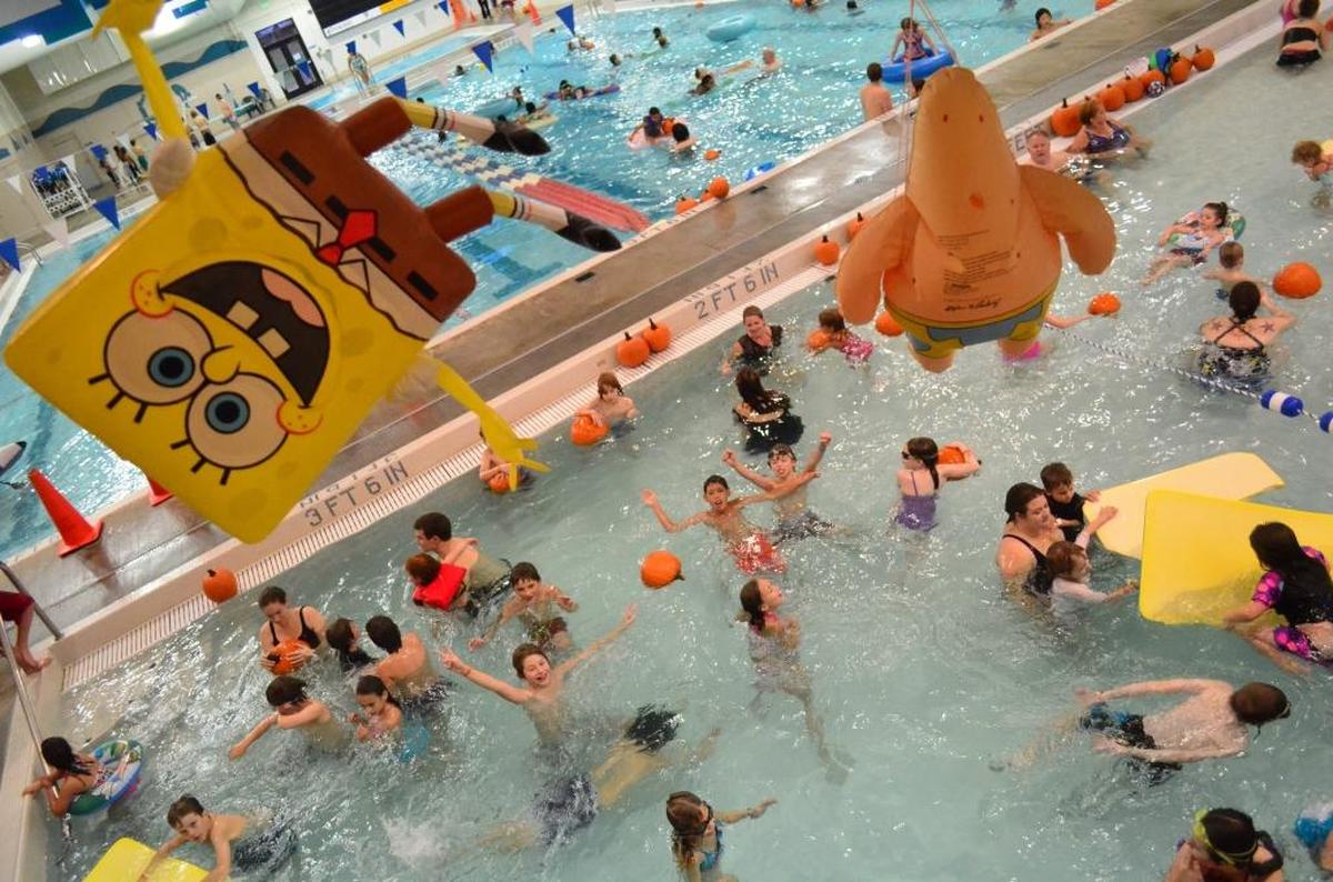 Scenes from the Arne Hanna Aquatic Center’s Pumpkin Patch in the Pool in 2013. Lifeguards threw dozens of pumpkins in to each of the pools, allowing kids to pick their favorite to gather and take home.