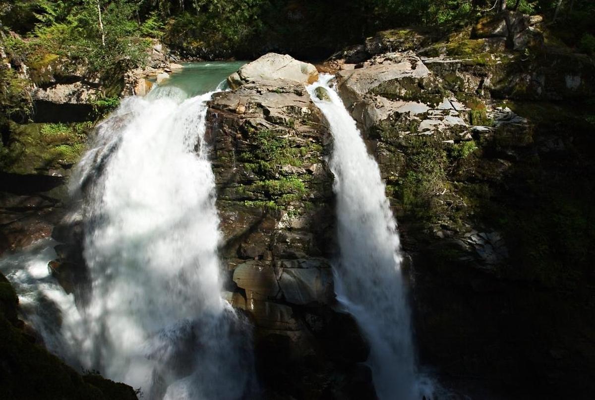 Nooksack Falls is on the Nooksack River, east of Glacier. A Navy helicopter aided in the rescue July 29 of an unidentified person who reportedly fell over the falls.