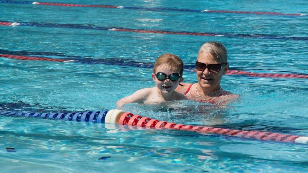 Tish O’Keefe works with a student at the Whatcom Family YMCA, where a local version of “Safety Around Water” is planned this year.