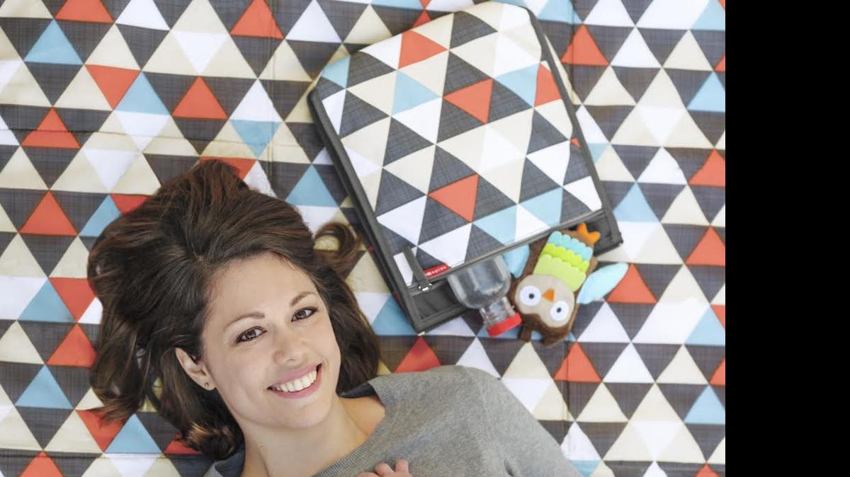 
Skip Hop’s outdoor blanket and cooler bag makes outtings with kids easier.
