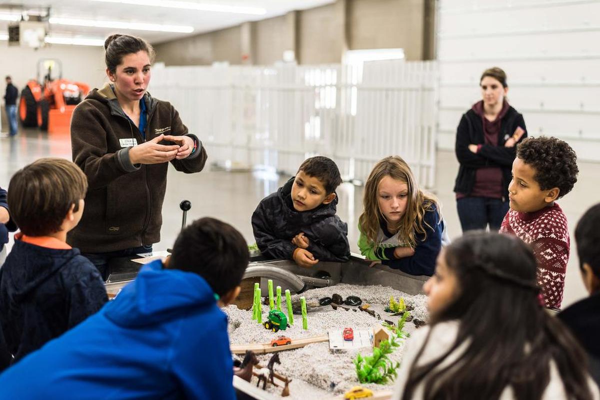 Corina Cheever, farm planning coordinator for the Whatcom Conservation District, engages the next generation of land stewards with the Whatcom Explorer: Mobile Watershed during the Whatcom Farm Circle’s three-day educational event for third-graders at the Northwest Washington Fairgrounds.