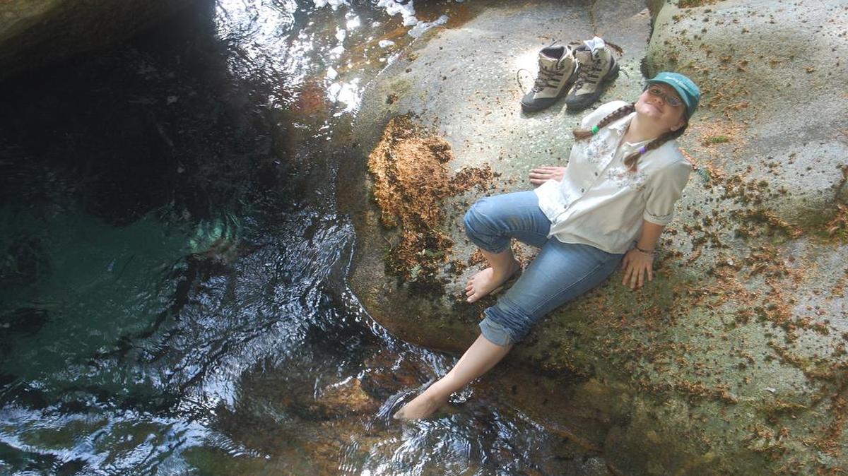 
Leah Sauter of Bellingham dabbles her toes in the water along the Ladder Creek Falls Trail in 2010.
