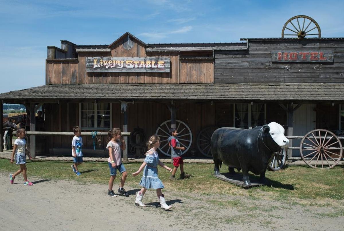 Kids play during a birthday party at Dan Cramer's Western Town on Saturday, July 8, in Lynden.