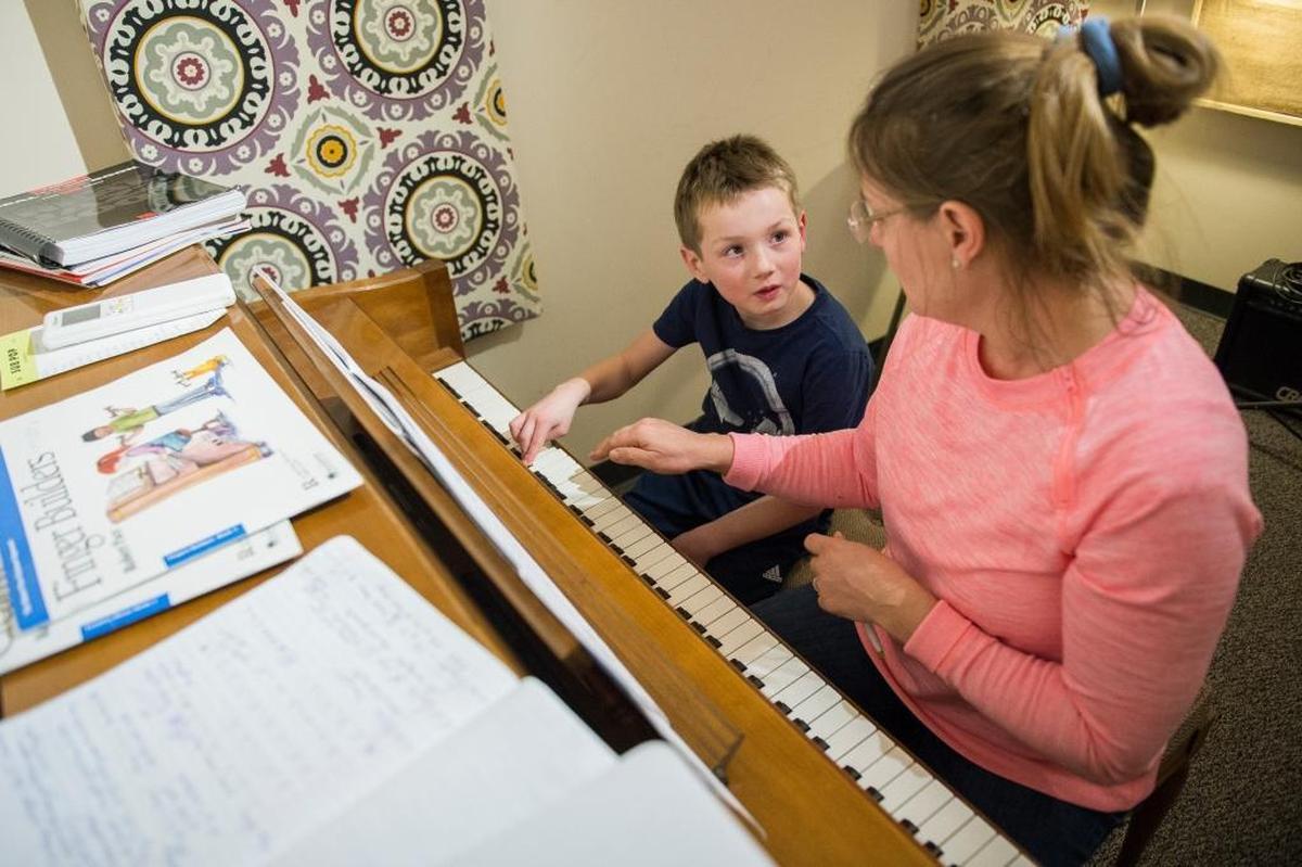Nan Meaker, right, gives piano lessons to Lander Wolfe at Bellinghome School of Music on Feb. 6 in Bellingham.