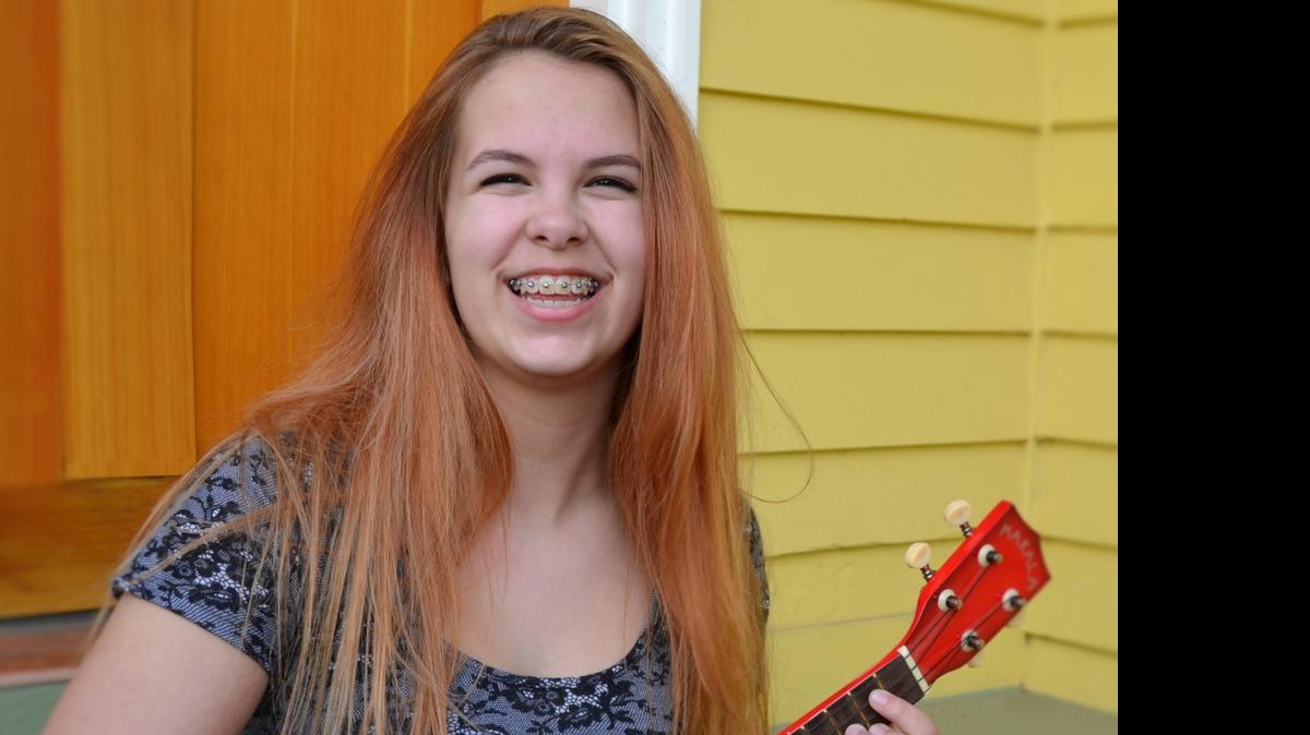 
Lola Russo plays her ukulele on a sunny Sunday afternoon at home in Bellingham.
