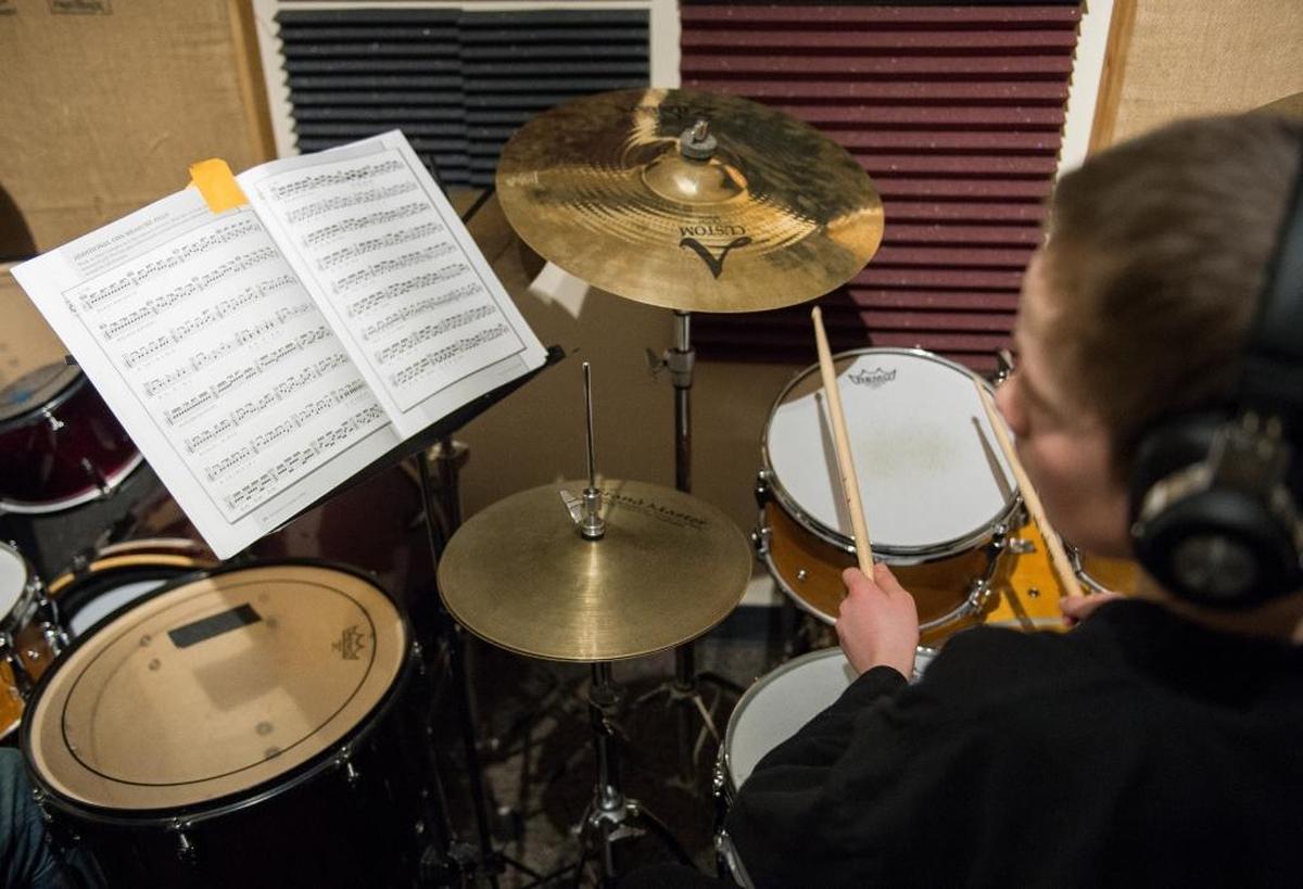 Kiran Wolfe plays drums during a lesson at Bellinghome School of Music on Feb. 6 in Bellingham.