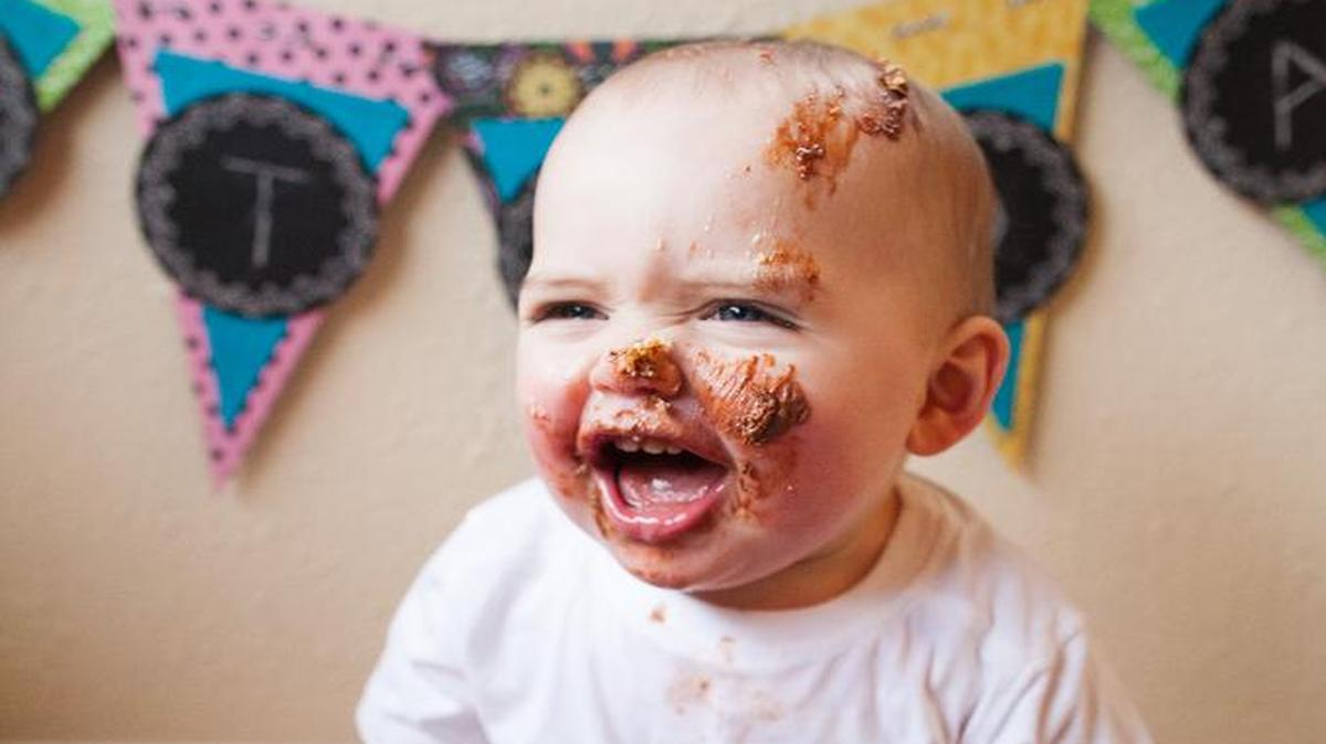 
One-year-old Ryder hollers with joy after tearing intro his birthday cake in January 2015.
