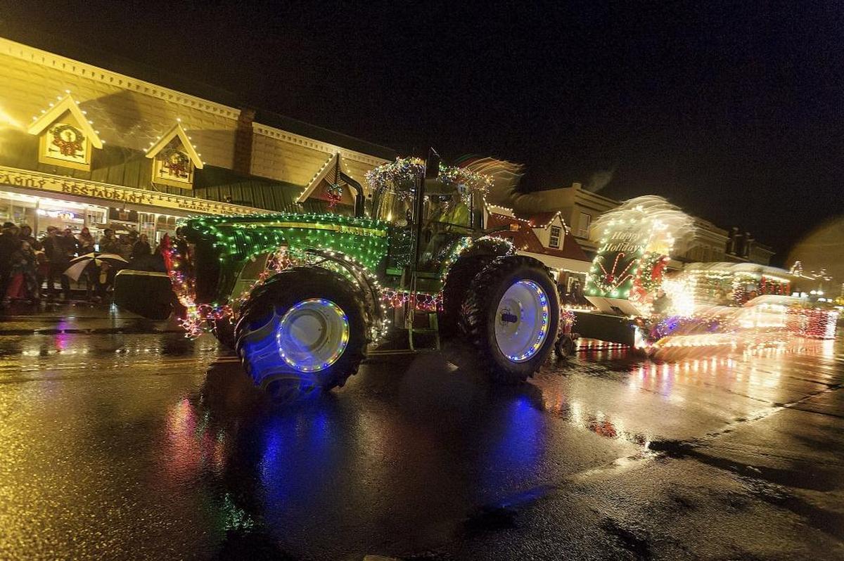 The Edaleen Dairy float drives along Front Street during the Lighted Christmas Parade on Saturday evening Dec. 3, in downtown Lynden..